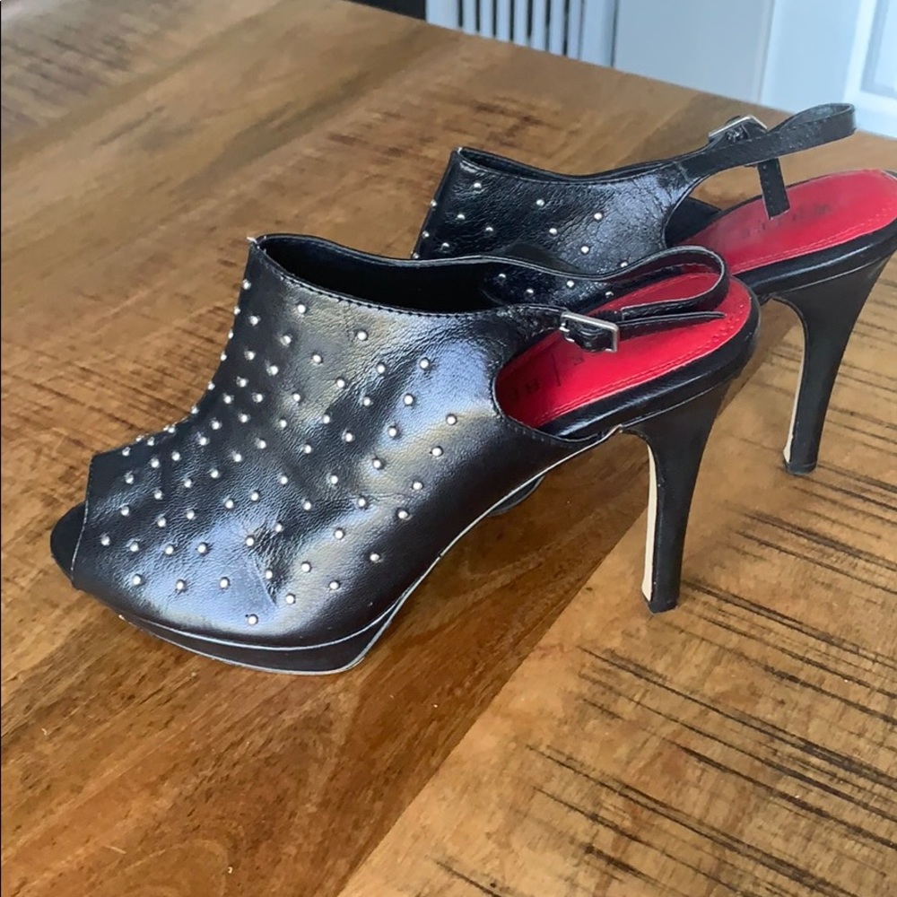 Open toed sexy studded heels.